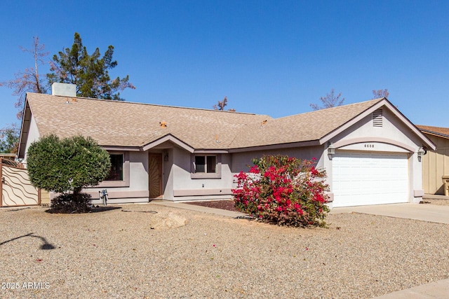 ranch-style house featuring driveway, roof with shingles, an attached garage, and stucco siding