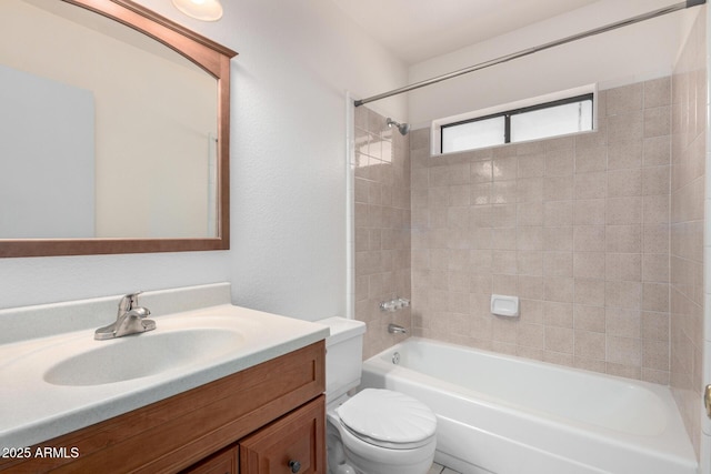 full bath with tub / shower combination, vanity, and toilet