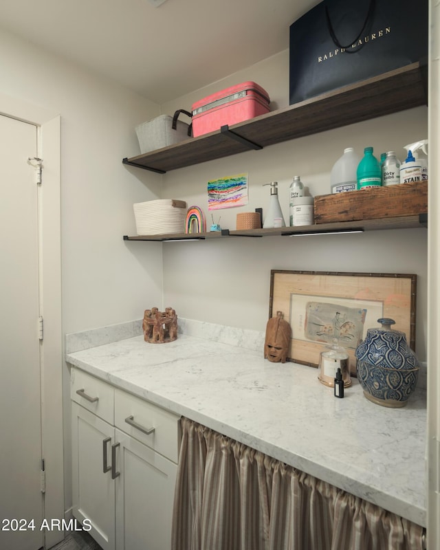 interior space with light stone countertops