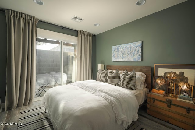 bedroom featuring dark wood-type flooring