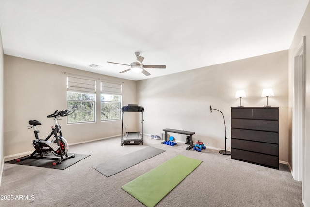 workout room with visible vents, a ceiling fan, baseboards, and carpet floors