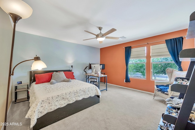 bedroom with carpet flooring, baseboards, and ceiling fan