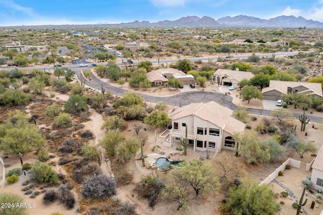 drone / aerial view featuring a mountain view