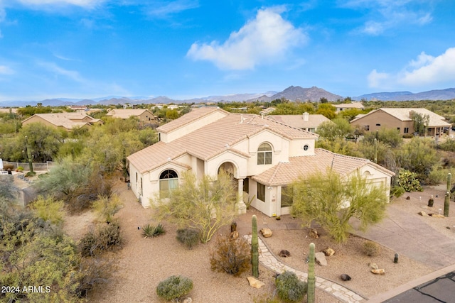 view of front of home with a mountain view