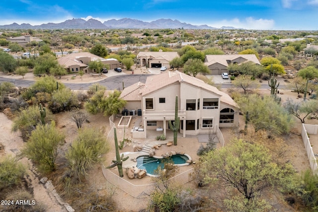 drone / aerial view featuring a mountain view