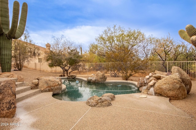 view of swimming pool featuring a patio