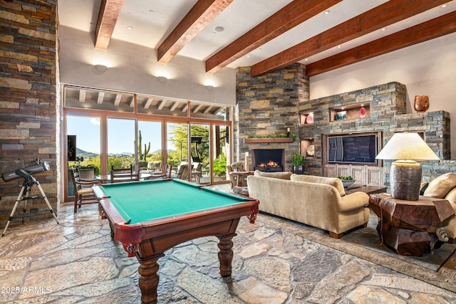 rec room featuring a fireplace, beam ceiling, and billiards