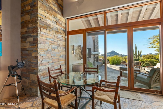 dining room with a mountain view