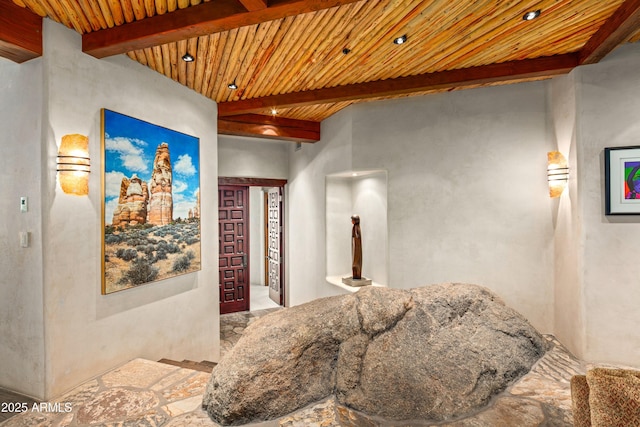 bedroom featuring beam ceiling and wooden ceiling