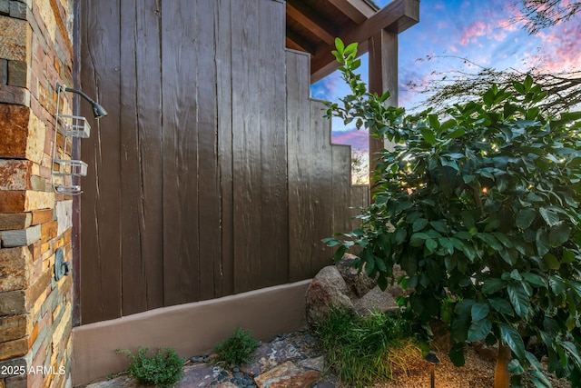 view of property exterior at dusk