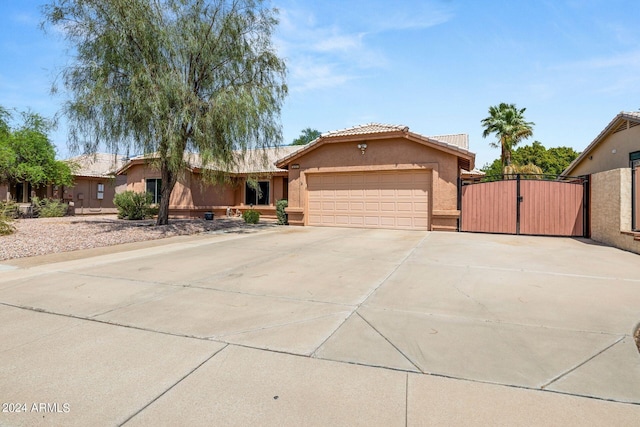 view of front of property with a garage