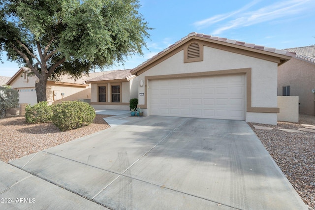 ranch-style house with a garage