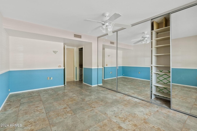 unfurnished bedroom featuring a closet and ceiling fan