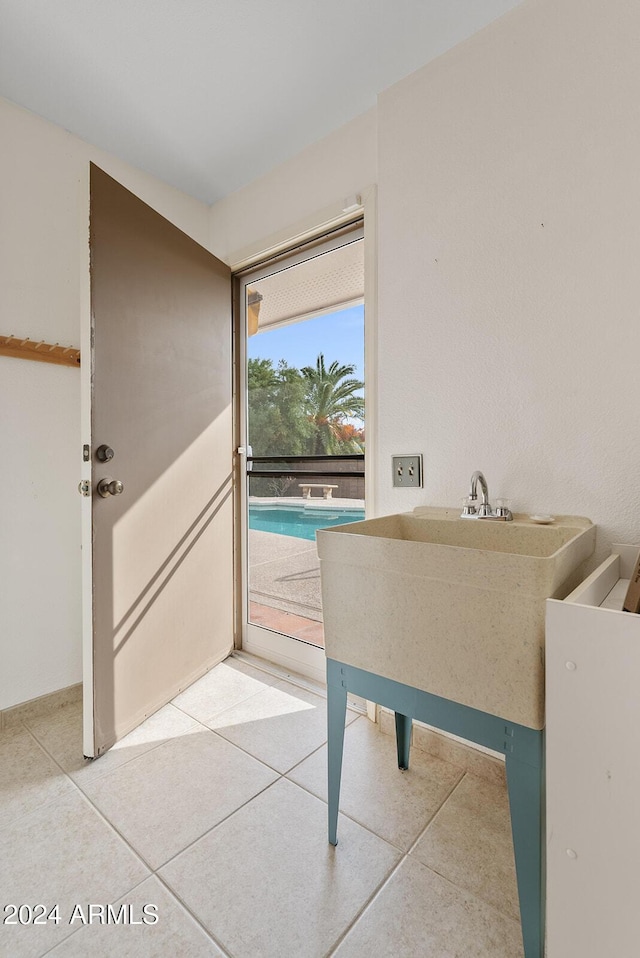 unfurnished office featuring tile patterned floors