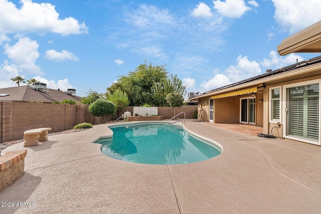 view of pool with a patio