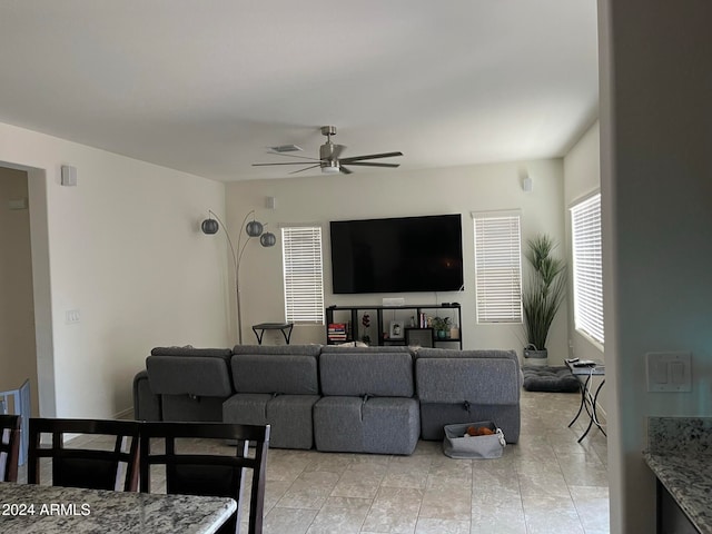 living room featuring ceiling fan