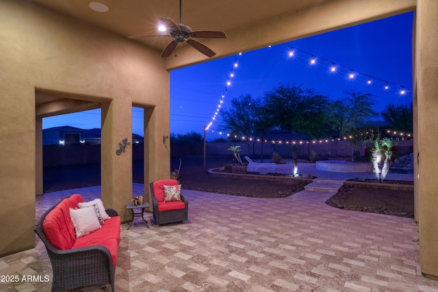 patio at twilight with ceiling fan