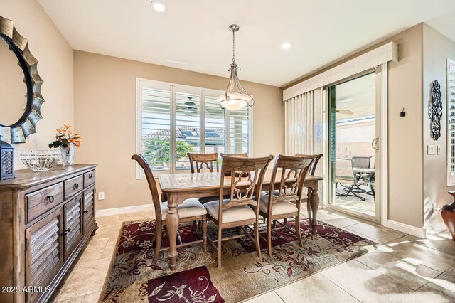 dining area with recessed lighting and baseboards