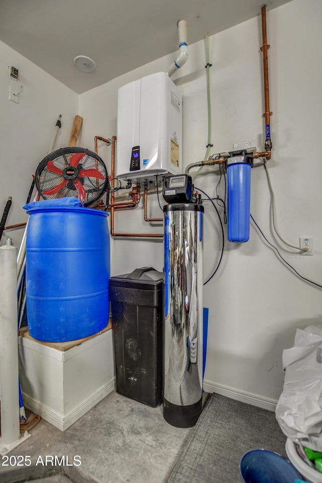 utility room with tankless water heater