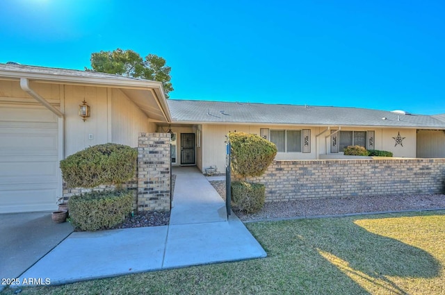 entrance to property featuring a garage