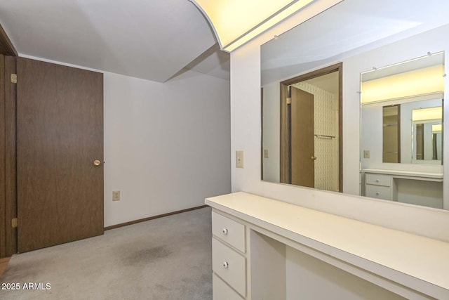 bathroom featuring baseboards