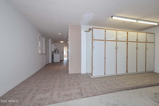 garage featuring washer / dryer