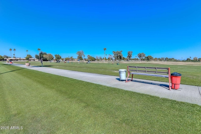 view of home's community with a lawn