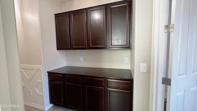 kitchen with dark brown cabinets