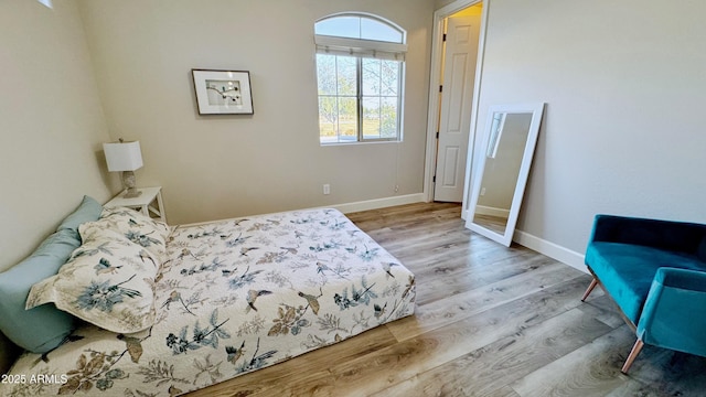 bedroom with light hardwood / wood-style floors