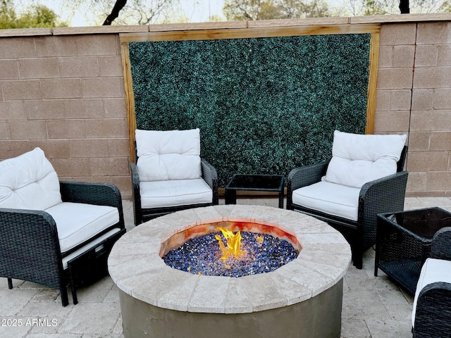 view of patio / terrace featuring a fire pit