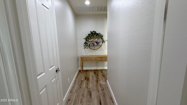 corridor featuring light wood-type flooring