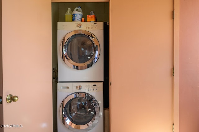 12212 N Paradise Village Pkwy S Unit 451, Phoenix, AZ 85032 - laundry area featuring stacked washer / dryer and laundry area