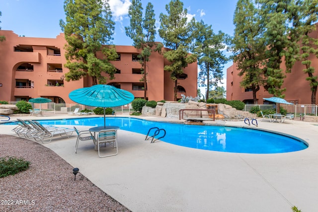 view of pool with a patio area