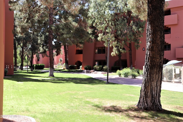 12212 N Paradise Village Pkwy S Unit 451, Phoenix, AZ 85032 - view of community featuring a yard