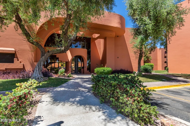 12212 N Paradise Village Pkwy S Unit 451, Phoenix, AZ 85032 - view of property featuring uncovered parking
