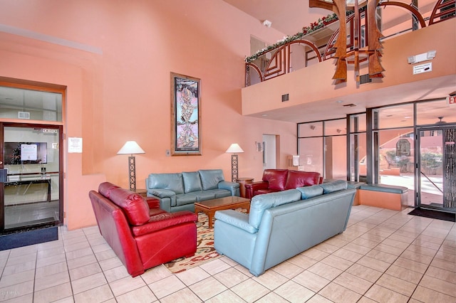 12212 N Paradise Village Pkwy S Unit 451, Phoenix, AZ 85032 - living area with light tile patterned flooring, visible vents, and a high ceiling