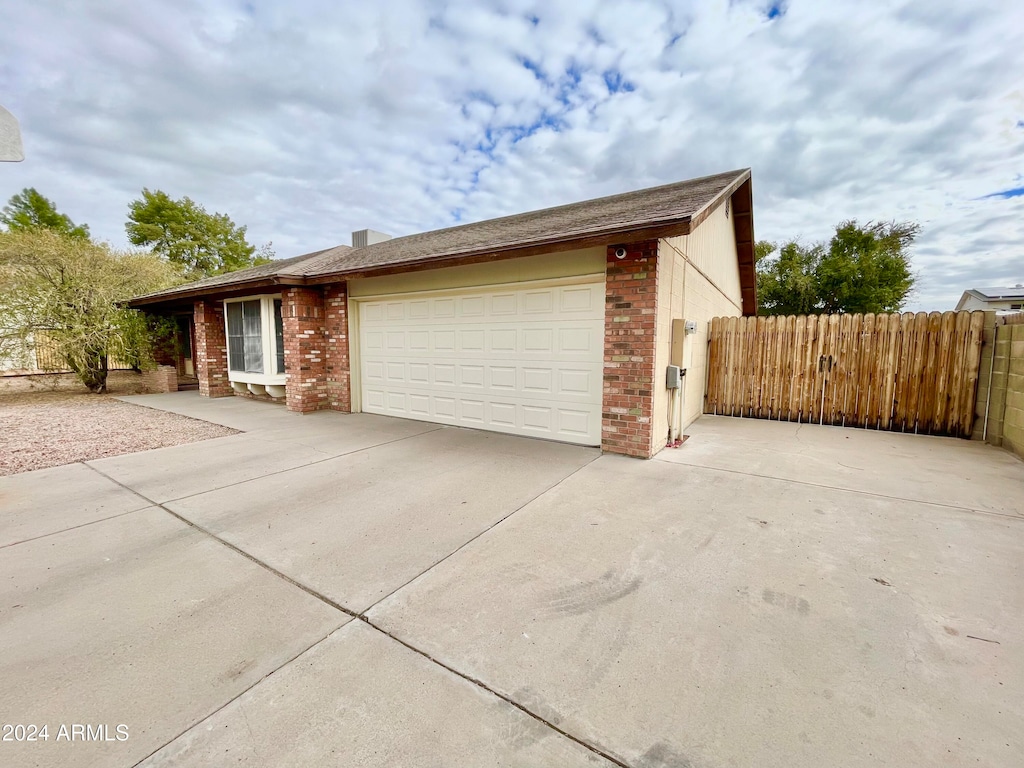 view of home's exterior featuring a garage