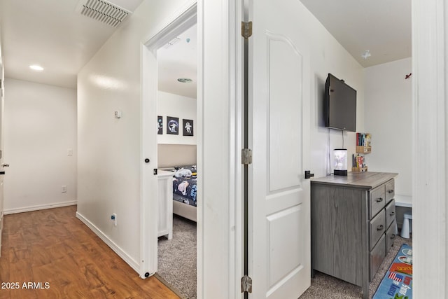 25218 W Carson Ct, Buckeye, AZ 85326 - corridor featuring wood finished floors and baseboards