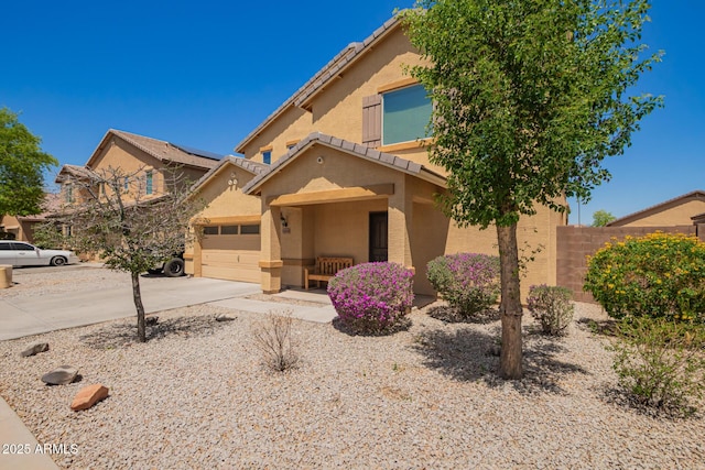 25218 W Carson Ct, Buckeye, AZ 85326 - townhome / multi-family property featuring concrete driveway, stucco siding, and a tiled roof