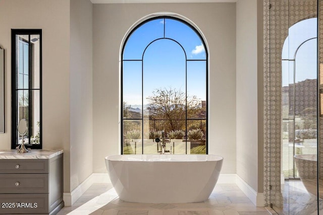 bathroom featuring a washtub