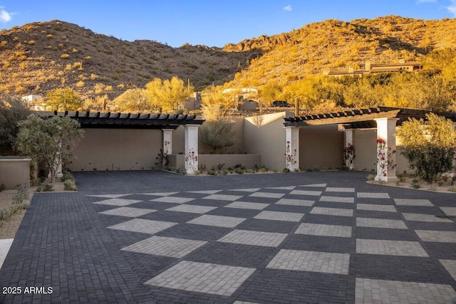 view of front of property with a mountain view