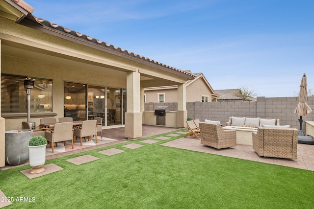 view of yard with a patio area, fence, and an outdoor hangout area