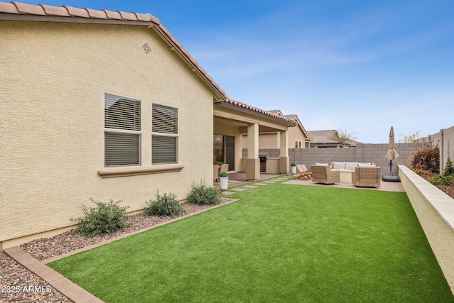 view of yard with an outdoor hangout area, a patio area, and a fenced backyard