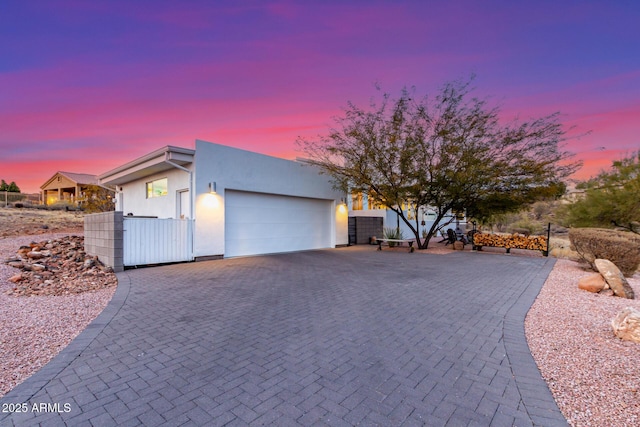 view of front of property with a garage