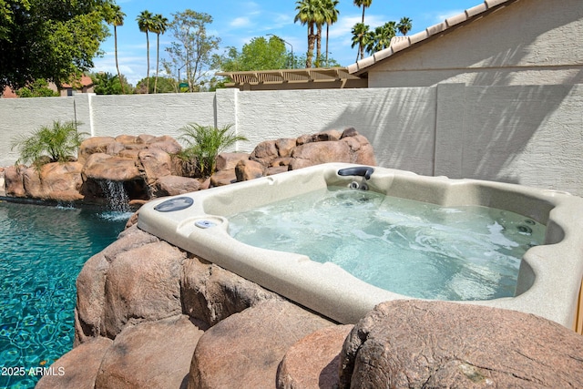 811 S Pearl Dr, Gilbert, AZ 85233 - view of pool featuring a fenced backyard and a jacuzzi