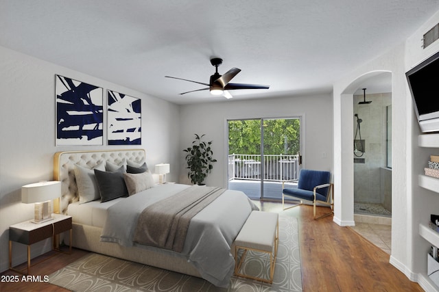 811 S Pearl Dr, Gilbert, AZ 85233 - bedroom featuring arched walkways, wood finished floors, access to exterior, and a ceiling fan