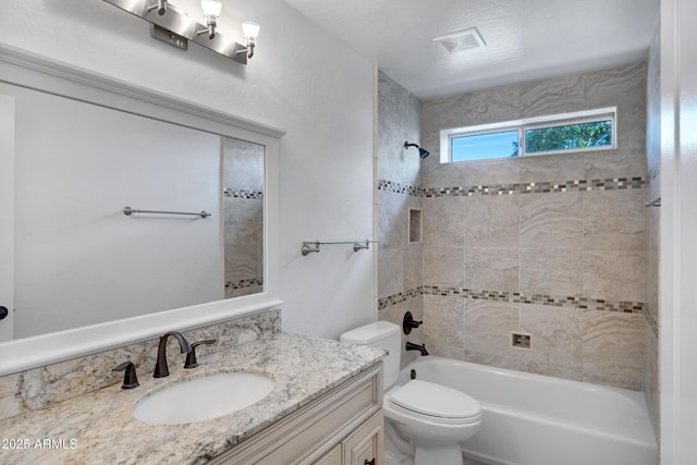 811 S Pearl Dr, Gilbert, AZ 85233 - bathroom featuring vanity, toilet, shower / washtub combination, and visible vents
