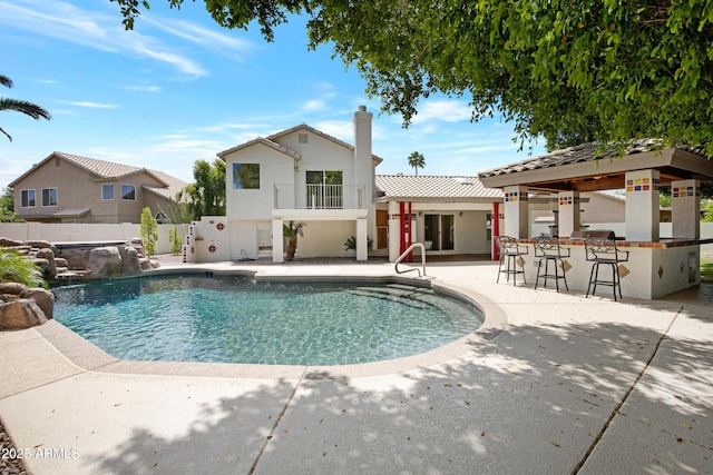 811 S Pearl Dr, Gilbert, AZ 85233 - view of swimming pool with outdoor dry bar, a fenced in pool, a patio, and fence