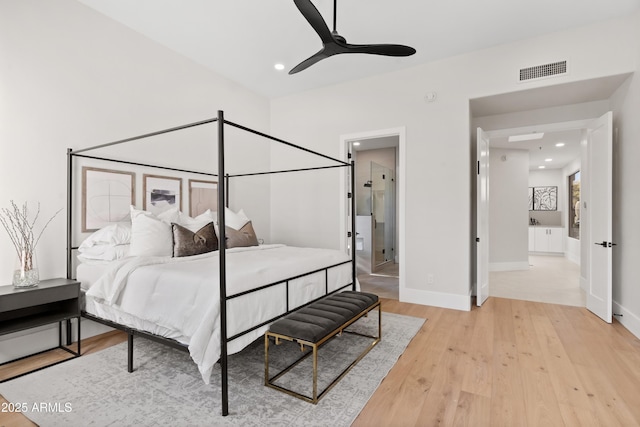 bedroom featuring ceiling fan and light hardwood / wood-style flooring