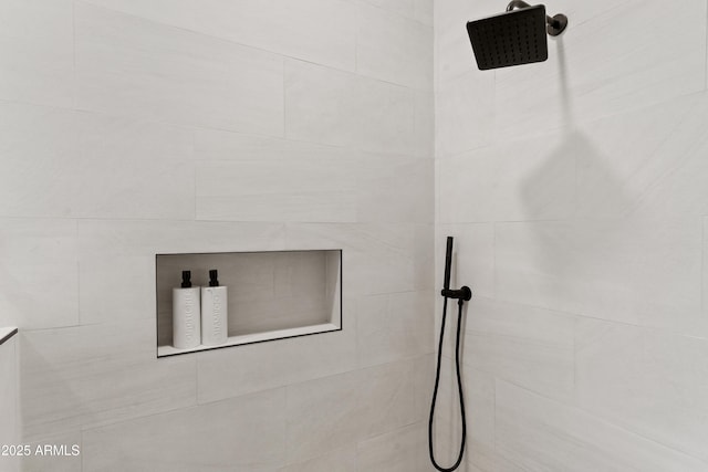 details featuring a tile shower